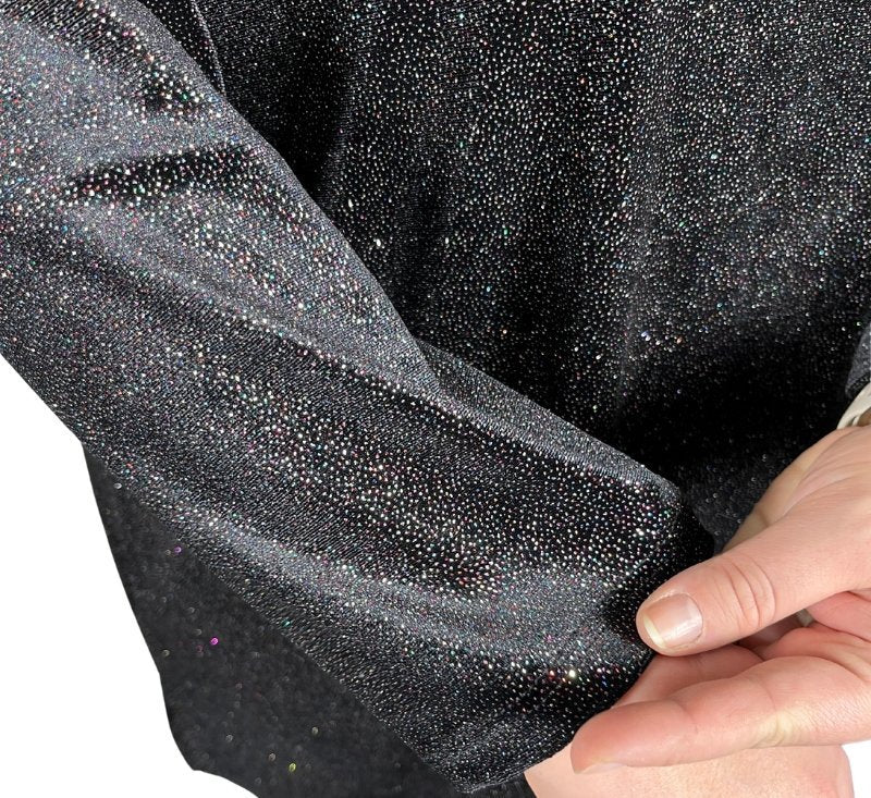 Erna zwarte glitter lange mouwen - laatste in maat 58/60