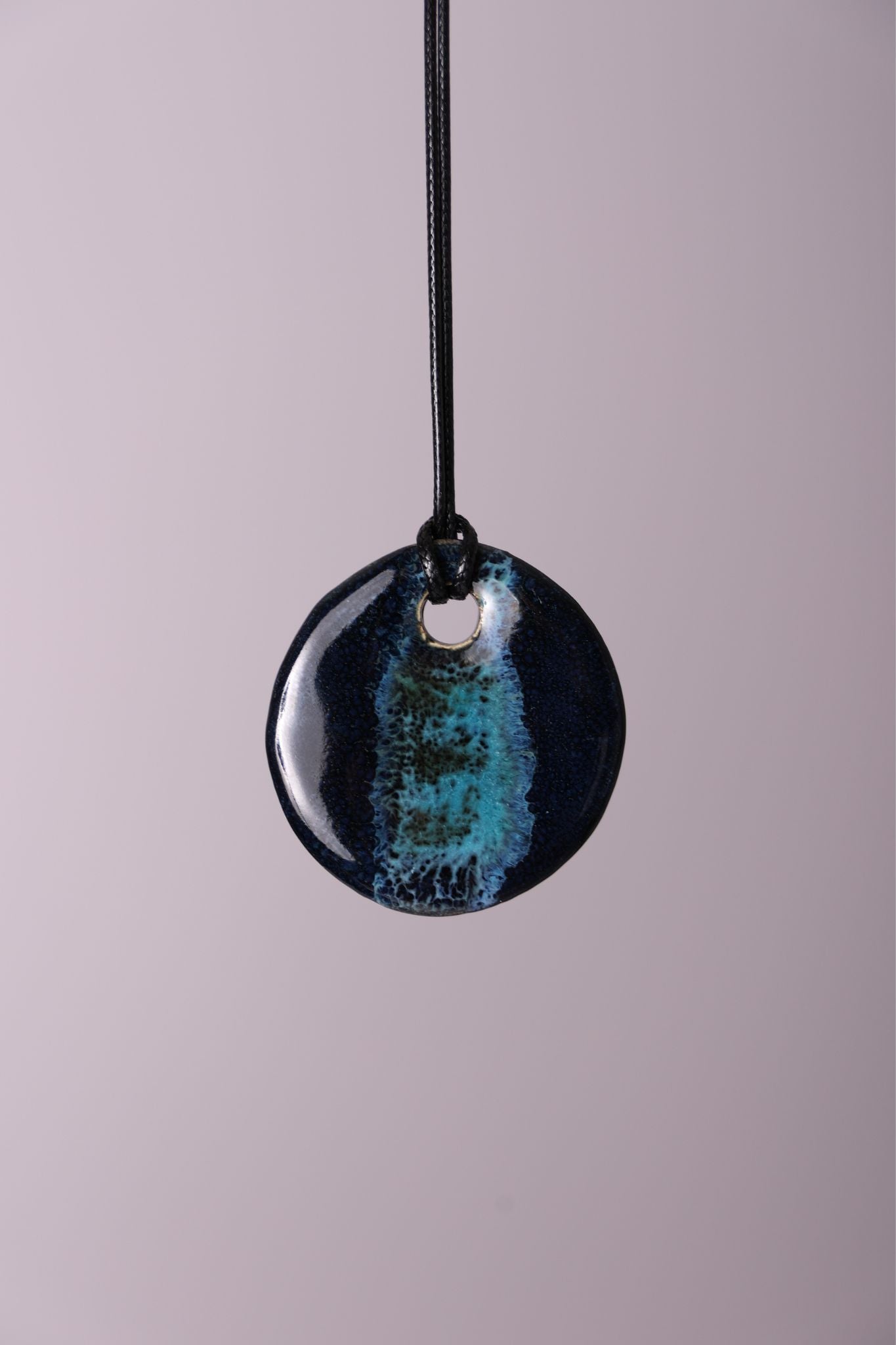 Ketting keramiek rond donkerblauw turquoise